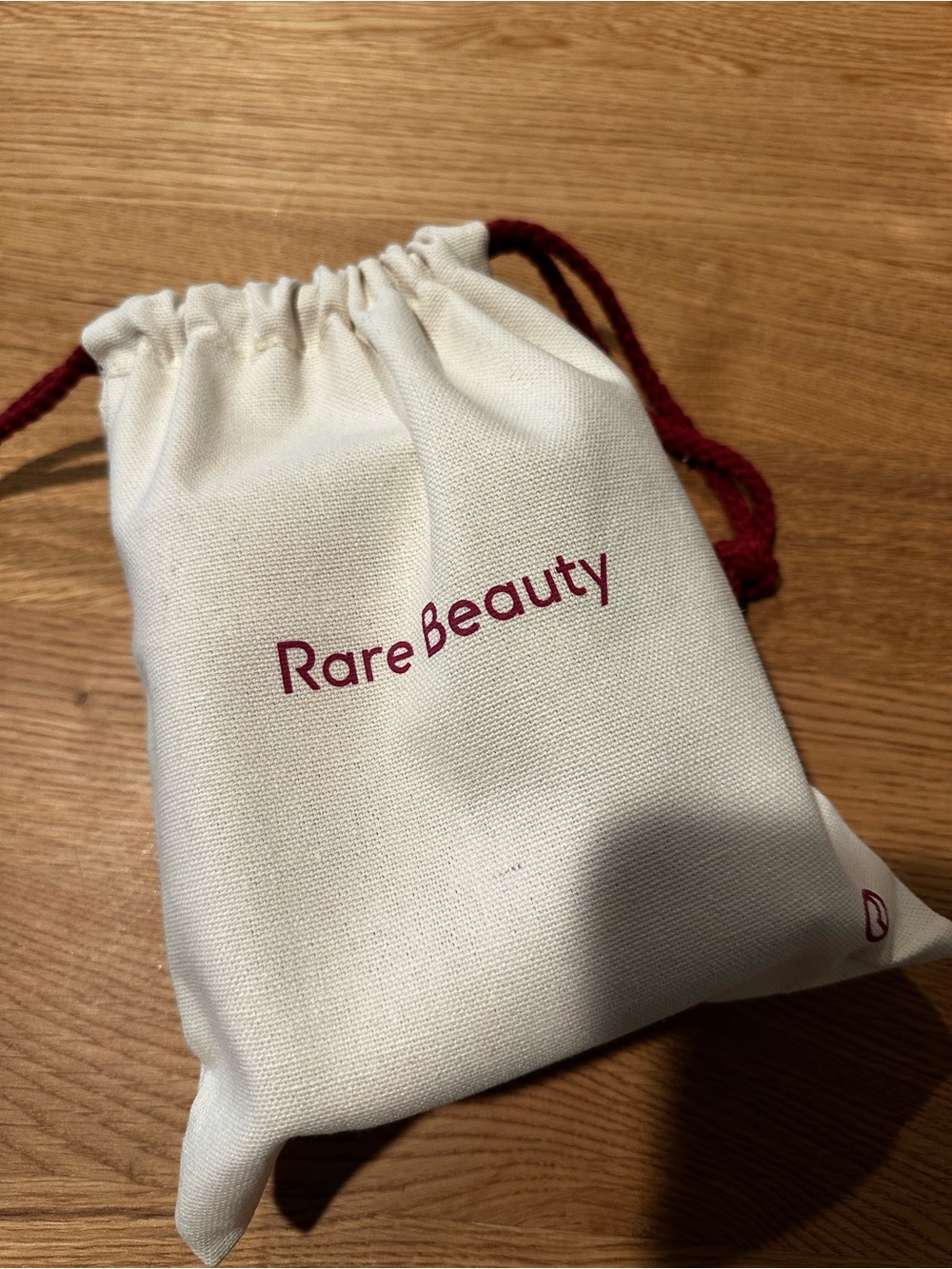 Rare Beauty Cream Drawstring Pouch w lotion and spray